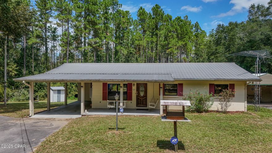 Getaway in the country! This 3br/2ba  block home has so much to offer: Metal roof, HVAC 2020, water heater 2023, 13.8 acres with planted pines, RV barn with electric, fish cleaning station, fully powered work shop, and oodles of storage. Enjoy the peace and quiet. Plant a garden. Start a home business. The potential is endless! Located only 35 minutes from shopping, dining, and the world's most beautiful beaches.