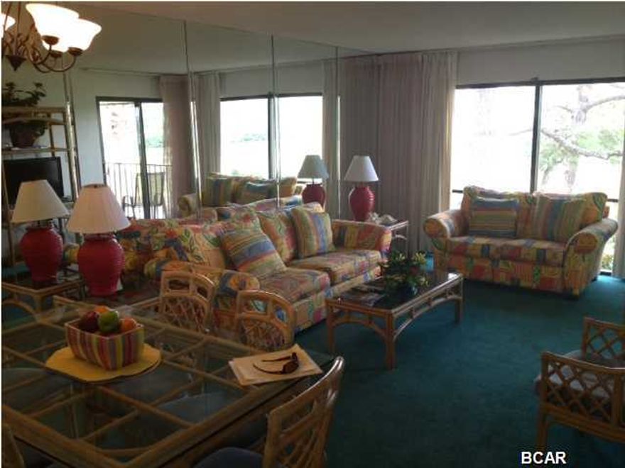 THIS IS A VERY WELL MAINTAINED VILLA ON SECOND FLOOR. THE UNIT HAS A VIEW OF THE GOLF COURSE AND LAGOON, AND COMES FULLY FURNISHED WITH BEAUTIFUL FURNITURE. CAN SLEEP UP TO 6 PEOPLE, AND HAS A GREAT RENTAL HISTORY.