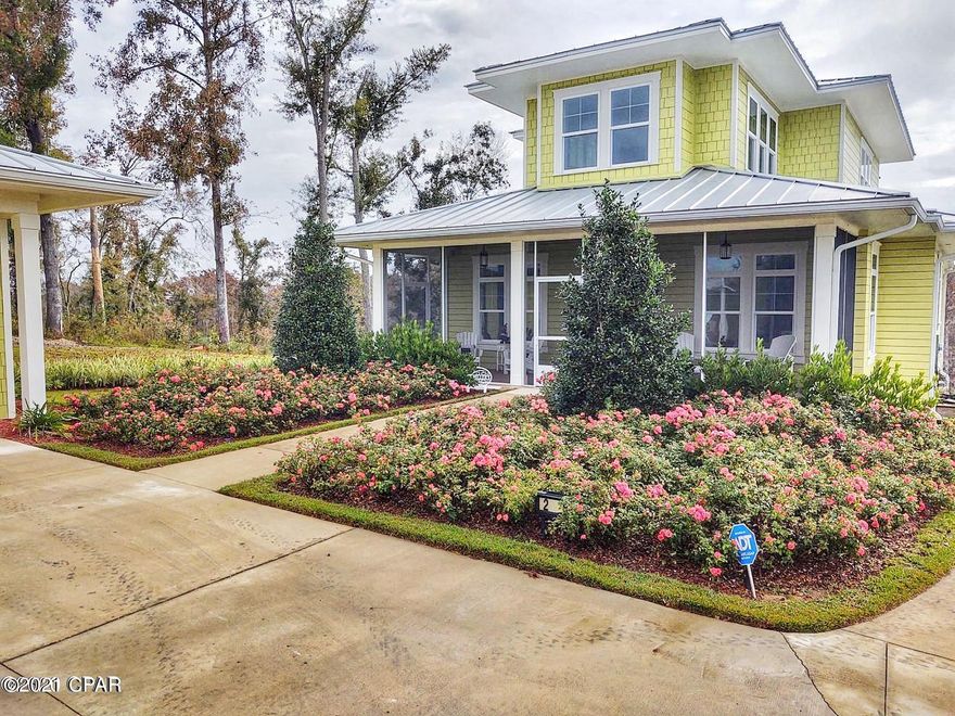 SPRING PRICE REDUCTION!!  On a NEW, BEACH STYLE, WATERFRONT HOME.  This lovely new home sits on over an acre of waterfront on the pristine waters of Merritt's Mill Pond near Marianna, FL.  The waters of this lake feed from five Catagory 1 natural springs which pour out over 80,000 gallons of pure spring water every day!  This 3400 sf waterfront home is a four bedroom, four bathroom beauty designed for comfort and enjoyment.  The outside appears to be a beautiful wood home, but the siding and soffets are all made of Hardi-board for maintenance free living.  The roof is a raised seam metal roofing with over a 50 year warranty.   A nicely curving, concrete driveway leads from the adjacent roadway to the entrance of a completely finished, double garage and the front area of this outstanding ho A nicely curving, concrete driveway leads from the adjacent roadway to the entrance of a completely finished, double garage and the front area of this outstanding waterfront home. Sitting next to the garage is an inviting fire pit area, which blends into the total design concept.  

The bright and cheerful home interior features 10 foot ceilings, transom lights, barn doors, 100 year old antique re-purposed doors, shiplap siding walls, drywall ceilings, stylish ceiling fans, beautiful chandiliers, granite countertops, manufactored wood flooring throughout main home, etc.

Exterior enjoyment is complete with a beautiful dock, with cover sitting and party area, water slide, and boat docking cleats.  Immediately off the dock and party area is the pristine, spring fed waters of the lake for your summer and winter enjoyment.  As these waters stay a constant 68 degrees, you can actually enjoy swimming in them during the winter months!  You may also enjoy scuba diving in our beautiful underwater cave systems, try your hand at catching huge largemouth bass, or even a World Record Shell Cracker!!