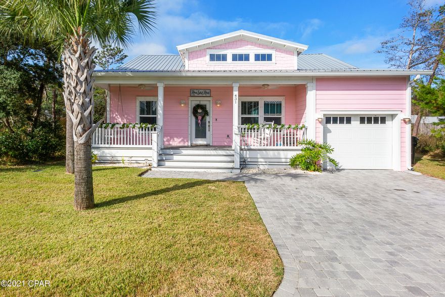 This beautiful home has it all, and it has been meticulously maintained. Paradise Grove is a wonderful, gated neighborhood with a community pool. This home has granite countertops, wood-look ceramic tile floors (great durability), stainless appliances, a new driveway, spray foam insulation, and the list goes on. The master bedroom has a soaker tub and dual vanity. This is a perfect place to call home. The garage has extra storage space. Enjoy the open living/kitchen area or cook out back on the covered porch.