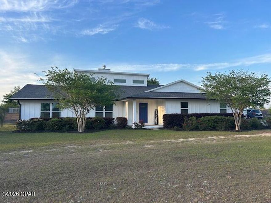 Fabulous home on 2.5 acres so close to town and only 30 minutes from Tyndall AFB and the Navy base, Publix and Starbucks are 2 miles away! When you walk into the very open floor plan you can see the spacious living room with a large wood burning fireplace. Travertine tile throughout the living , dinning, kitchen, and laundry room. Home has huge open spaces and vaulted ceilings. Favorite room in the whole house is the family room, 650 sqft with 22 ft vaulted ceilings, multiple large windows let so much light in. Perfect for entertaining! Separate bedroom spaces, a large bedroom off kitchen, two more large bedrooms on the other side of home, master bedroom is off the dining room. Master bedroom has a great closet and wonderful jetted corner tub with awesome walk in shower. Tons of storage spaces, home has spray foam insulation thoughout. Can we say tons of garage space? 3 car garage attached to home, a 1200 sqft detached garage that would make a cute mother in-law or rental home, with finish out, and a 2100 sqft detached garage! Huge, 44x22 inground pool for the kiddos! Pond with Bass, Bluegill, and one rescued turtle. This home has NO HOA so you can pretty much do what you want, also zoned R2 so you can have another residence on the property. Bougie chicken coup, for all your fancy egg layers. Would be great for business owner with lots of equipment or someone with tons of toys!
RV power pole, and shallow well with hand pump! This home truly has it all! *Professional pictures coming soon, but here's a sneak peek!