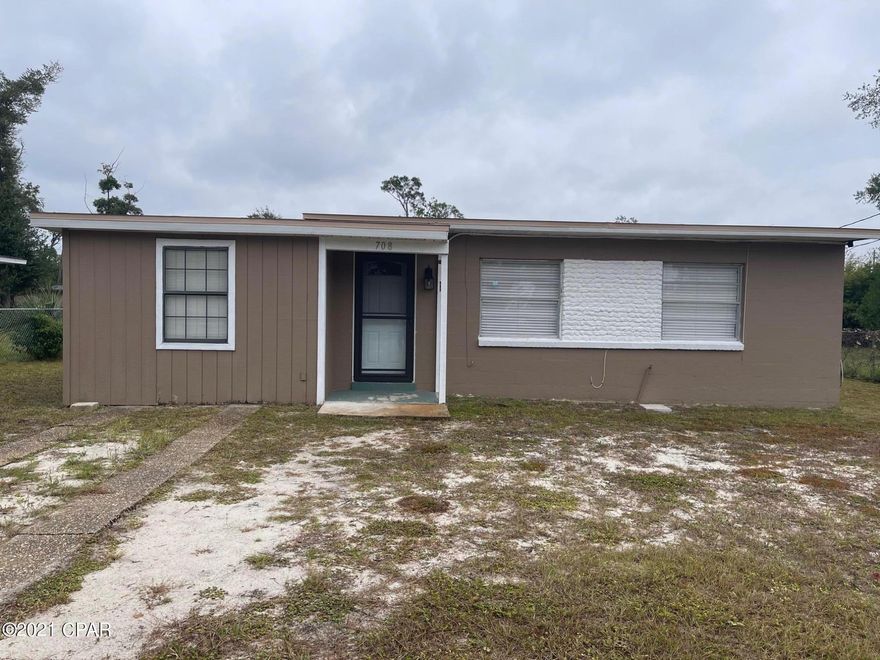 SWEET FLORIDA COTTAGE surrounded by other neatly kept Florida cottages in this quiet neighborhood.  Remodeled after Michael with new roof, A/C, flooring, appliances and new paint inside and out. The yard, front and back is fenced, the covered porch could easily be screened. The inside laundry is located off the kitchen. Home has dishwasher, refrig, stove/oven, washer and dryer that have been recently purchased and convey with the home. Close to downtown Panama City, with lots of restaurants, shopping and entertainment.