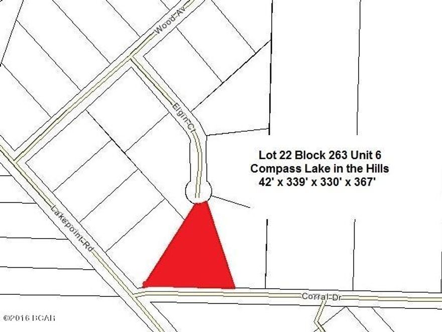 Very Pretty 1+ Acre Lot with nice Trees just 1/4 mi East of Hwy 231 which fronts on Elgin Ct and also has access from Corral Dr on the back boundary. This lot is in the Compass Lake in the Hills community in NorthWest Florida conveniently located just 20 minutes South of Interstate 10 at Marianna and 35 minutes North of Panama City for Shopping, Restaurants, Entertainment, and Beautiful Gulf Beaches. As an owner in this development you have access to Private McCormick Lake for Fishing, Swimming, Canoeing, Kayaking, etc as well as the Main Lodge over on Compass Lake with Swimming Pool, Tennis Courts, Horseback Riding, etc. Come enjoy the Quiet, Peaceful Lifestyle at Compass Lake in the Hills.