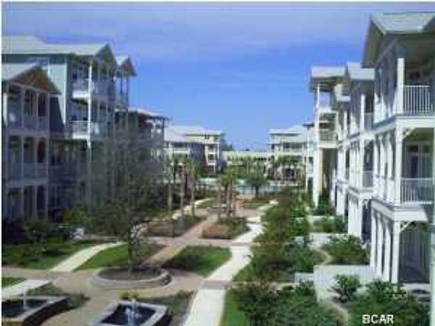 Experience an oasis at the beach. This is a 1 bedroom 1 bath with a study/bunk room, 1069 sq. ft. condo in the beautiful and tranquil gated community of Island Reserve, located off Front Beach Road in Panama City Beach. This open floorplan features hardwood flooring in the main living area, tile in the baths and kitchen, and plush padded carpeting in the bedroom, all with 10' ceilings. The well appointed kitchen includes granite countertops, stainless appliances, and detailed cabinetry. Bonus amenities include washer and dryer, window coverings, garden tub, private patio and covered garage parking and entry. The Island Reserve community features gorgeous ponds, fountains, waterfalls. Club house boasts fitness center, media center, indoor basketball court, aerobic center, game room