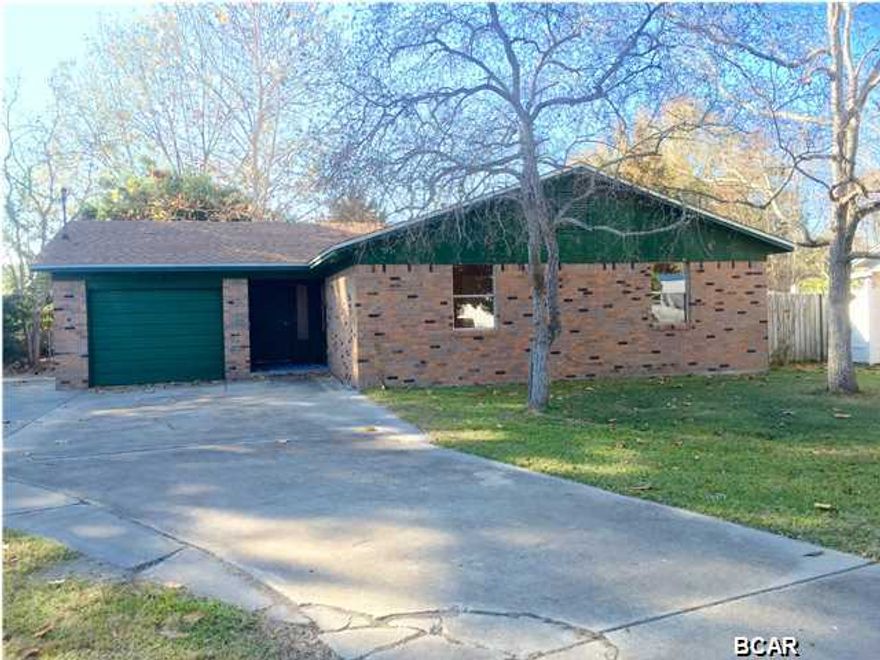 You won't find a better deal on a home like this one! This 3 bedroom 2 bath Callaway home is conveniently located in a quiet and friendly neighborhood near Tyndall AFB, shopping, schools, banks, etc. This home is very roomy giving it an open and airy feel. The house features an oversized garage with ideal space for a car and a golf cart. Take one step through the door and you're sure to love everything this home has to offer. This home recently received a new roof and has had several repairs completed. The bedrooms are good-sized and have brand new ceiling fans, paint and carpet in them, as do all the rooms in the house. This home is very clean and has been made like-new again. The living room and kitchen are both very open and spacious, and also have a nice view of the back yard.