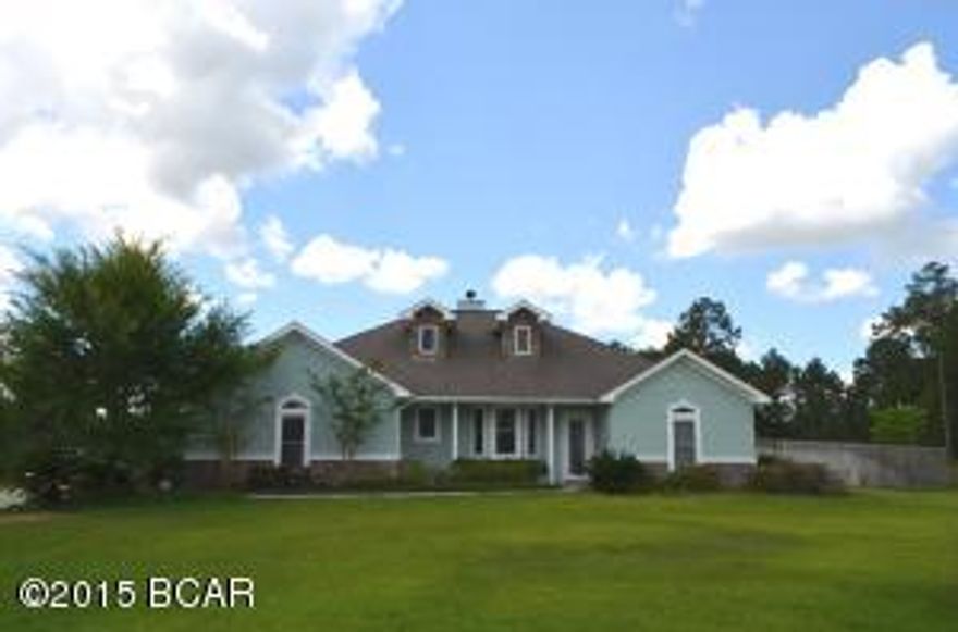 Extremely well cared for, beautiful custom home that offers the tranquility of a country setting with a modern feel and design. You will see immediately the manicured lawn and nice detail of the stone exterior paired perfectly with brand new paint including trim. Upon entering the split bedroom floor plan you will notice the elevated ceilings and open living and dining room area that makes this home feel very spacious and welcoming. The bedrooms are all oversized with plenty of closet space. Throughout the home you will find textured walls, extensive crown molding and baseboards, oversized doors, new carpet in the guest rooms, large tile and bamboo laminate flooring. The bathrooms each have detailed custom tile work and whirlpool tubs.