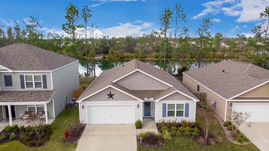 $0 down USDA-eligible and NO flood insurance required! This beautiful and well-maintained one-level home has four generous bedrooms and a 2-car garage. Entertain easily with the open floor plan, covered patio and large kitchen with walk-in pantry. A fenced yard offers privacy on the sides and stunning and expansive lake views from inside and out. The private master retreat has a spacious bedroom with breathtaking lake views, huge walk-in closet, and spa bath with dual vanities, separate shower and large soaking tub. Just minutes away, the 76-acre Harders Recreation Complex offers miles of trails, Baseball, Soccer, Softball and Football fields, playground and fishing areas, and even a model plane airstrip!