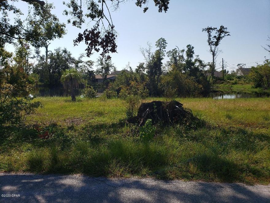 All sizes are apx---LOOKING FOR A GOOD DEAL--MONEY MAKER PROPERTY-----2 acres with large pond--needs loads of work but good wiring, water lines etc.    super location to build your dream home overseeing pond with ducks!!Contractors, builders, handy man, this could be your new project!!!!Seller is very motivated and will ''owner finance'' to right buyer!!(this home needs a world of repairs but main frame and roof could be used ) Includes a triple wide modular home situated on the west 1 acre of property.  (no title)