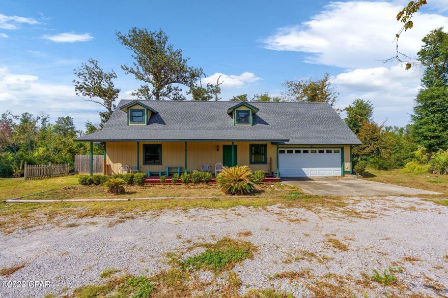 UNDER CONTRACT CURRENTLY TAKING BACKUP OFFERS Motivated seller! Waterfront with a boat dock and fish cleaning station. Inside you will find 4 bedrooms, 2 bathrooms and a massive screened in patio for enjoying the outdoors without having to deal with bugs. Bring your kayaks, canoes, paddle boards, fishing equipment and enjoy peaceful country living just outside of town.

Vacant lot available right beside property (9153 Sunshine MLS #733434)