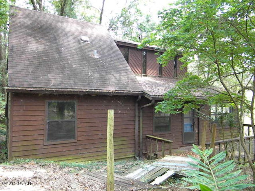 Large sq ft home with lots of potential, large deck to sit and enjoy the lake views, almost an acre with a 16 x 12 workshop, 2 fireplaces, master bedroom upstairs overlooking living room, basement is unfinished but could be a couple more bedroom with a sitting area, sliding glass doors take you out to the lake so lots of options with this fixer upper.