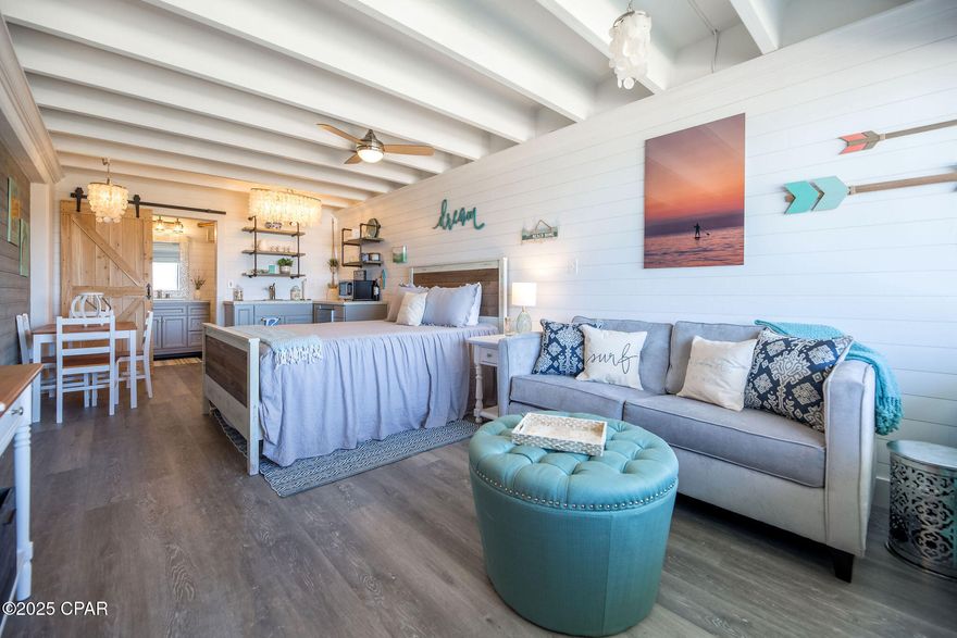 CURRENTLY UNDER CONTRACT, SELLER WILL CONSIDER BACKUP OFFERS ... IMPROVED SELLER FINANCING TERMS OFFERED - Probably one of the last opportunities to get Gulf Front, on the sand, for less than 200k!! This is one of the nicest, if not THE nicest unit in the entire building, every inch of this condo has been given attention. Redesigned and decorated by a professional interior designer, complete remodel includes - Vaulted ceilings, crown molding, LVP flooring, shiplap walls, custom polished concrete countertops with a little history sprinkled in, high end tiling in shower, open shelving, barn door leading to bathroom, custom lighting... this unit has it all! Overlooking the newly remodeled pool, your Gulf views from the living room are unobstructed and stretch to the East over 1 mile of uncrowded beach. Condo has been a vacation rental over the last five years and has an excellent rental history. Don't worry about bills as your HOA fees include everything, even electric! Fontainebleau Terrace is experiencing a bit of a renaissance with many owners remodeling individual units and a newly remodeled pool and decking area. Truly one of the best, this unit is a must see - schedule your showing ASAP!