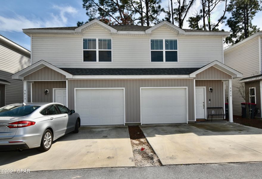Well kept, like-new townhome close to the water ... move-in ready or turn-key investment in the heart of Panama City Beach; surrounded by an abundance of stores and restaurants, and only minutes to schools, shopping, and Naval Support Activty! This home is less than a mile (approx. 15 minute walk) to the white sands of the emerald coast (public beach access point #21). This home offers a spacious open floor plan with 3 bedrooms and 2.5 baths. Highlights include white shaker style kitchen cabinets, granite counter-tops, kitchen backsplash, plank laminate flooring, under stair storage, and all appliances shown to include a refridgerator, washer, and dryer. The half bath is conveniently located on 1st floor, while all bedrooms and two full baths are on second floor. The master suite is very large with a spacious walk-in closet, and master bath offers a double vanity. Call for your private tour today ... it won't disappoint! All measurements are approx; buyer to verify if important.