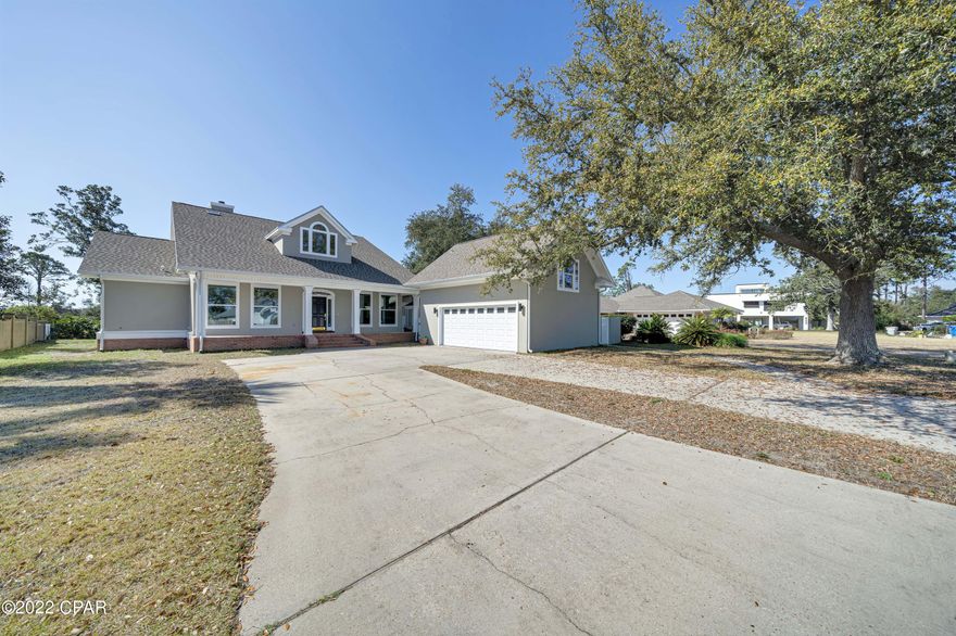 This custom-built 4 bedroom 3.5 bath home was constructed by McIntosh & Myers and their attention to detail is demonstrated throughout this home. As you enter this home you will fall in love with its grand foyer, large living room with a gas fireplace to relax, large kitchen with new Kitchenaide appliances (gas cooktop, hood, ice maker, builtin oven, microwave, Refrigerator, and new Whirlpool front loader washer and dryer), as well as large-sized bedrooms. You have three bedrooms in the main house and one over the garage with a full bath. This home has been completely remodeled with new tile flooring, new custom cabinets in the kitchen, baths, and laundry room, top-of-the-line faucets, new light fixtures, and so much more this hous