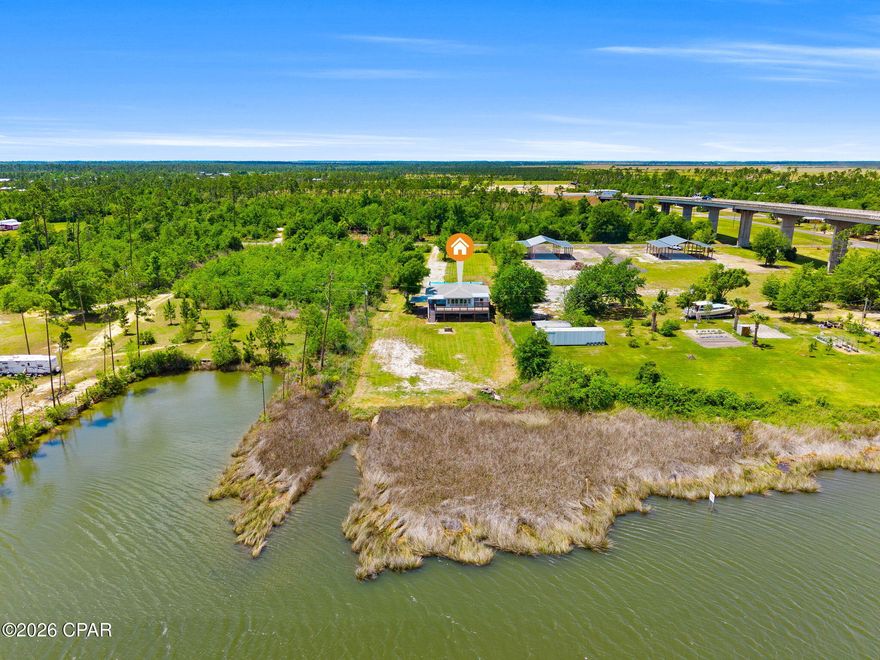 Welcome to your slice of waterfront paradise on the Intercoastal Waterway! This beautifully designed 3-bedroom, 2-bathroom home offers the perfect blend of comfort, natural light, and breathtaking views.
Step inside to a bright and airy living space filled with tons of natural lighting, enhanced by light hard wood flooring that creates a warm and inviting coastal feel. A double set of large sliding glass doors draws your eyes straight to the water, seamlessly blending indoor and outdoor living while showcasing stunning, unobstructed views of the Intercoastal.
The kitchen is both stylish and functional, featuring light wood cabinetry, bright countertops, and a spacious walk-in pantry--perfect for keeping everything organized while maintaining the home's clean, coastal aesthetic.
Enjoy morning coffee or evening sunsets from not one, but two spacious decks--perfect for entertaining guests, relaxing with family, or simply soaking in the peaceful waterfront setting.
The master suite is a private retreat featuring its own ensuite bathroom with a double vanity, walk-in closet, and serene views. Two additional bedrooms offer flexibility for guest accommodations, a home office, or hobby space.
Downstairs is a blank canvases with two large open spaces that can be finished out or left open for a game room, a workshop or what ever your heart desires. 
with the HVAC and water heater just a few years old, updated plumbing and electrical through out most of the house this home is low maintained and turn key. 

Whether you're looking for a full-time residence, vacation home, or investment opportunity, this waterfront gem delivers the lifestyle you've been dreaming of. Don't miss your chance to own a piece of the Intercoastal!
