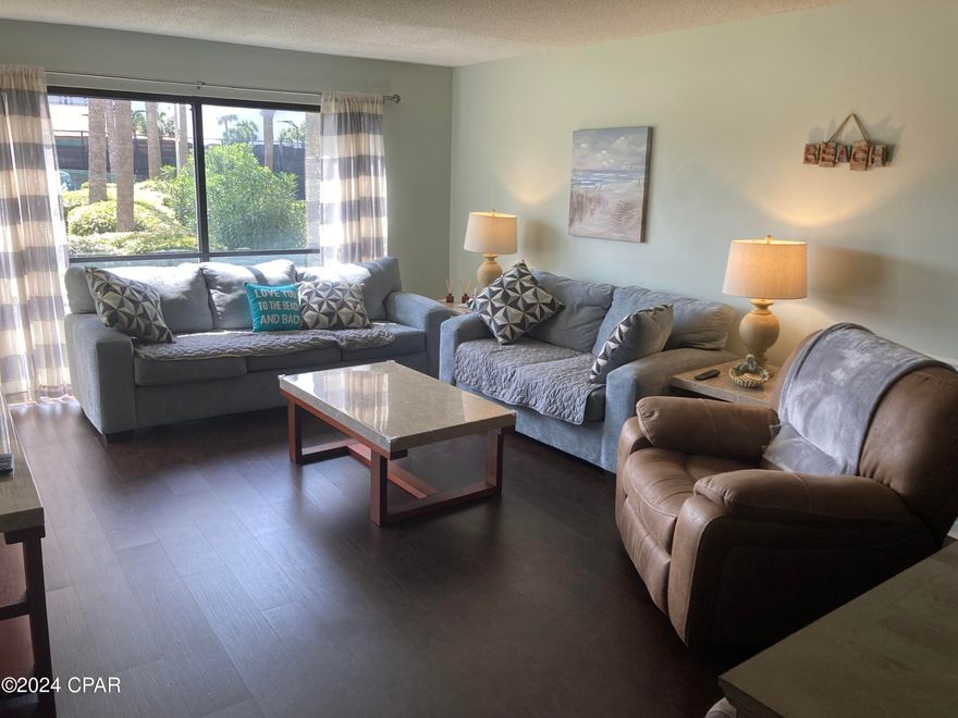 ***MOTIVATED SELLERS*** 2bd, 2ba tennis villa just a few steps from a heated pool, basketball and tennis courts!! This ground floor condo has been meticulously maintained by the sellers and except for an occasional snowbird has been a non rental. Flooring and most furniture and appliances are about 3 years new, and the building roof was replaced in 2022. Edgewater Beach Resort has multiple dining options including a private gulf front dining restaurant, a 9 hole golf course, 11 heated swimming pools and whirlpool spas, tennis, pickleball and basketball courts, shuffleboard courts, tram rides available to get you to the beach, and many other incredible amenities to keep you entertained whether you are a permanent resident or enjoying your vacation. Hurry before this little gem gets away! All information is approximate and should be verified by buyers if important.