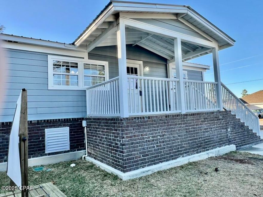 Welcome home to this beautifully remodeled 3 bedroom, 2.5 bath home situated on 1/3 of an acre with no HOA! Completely updated in 2022, this home boasts charming brick skirting, durable hardy board siding, and a metal roof. The spacious front and side covered porches provide the perfect spots to relax and enjoy the outdoors, while the large yard offers plenty of space for play or entertaining. Inside, you'll love the open-concept family room and kitchen, ideal for gatherings. The kitchen features stunning cabinetry and ample counter space. The home includes a guest bedroom, an additional bedroom with a half bath, and a large master suite with a walk-in closet and an updated en-suite bathroom. Laminate flooring throughout. Buyer to verify all information and dimensions.