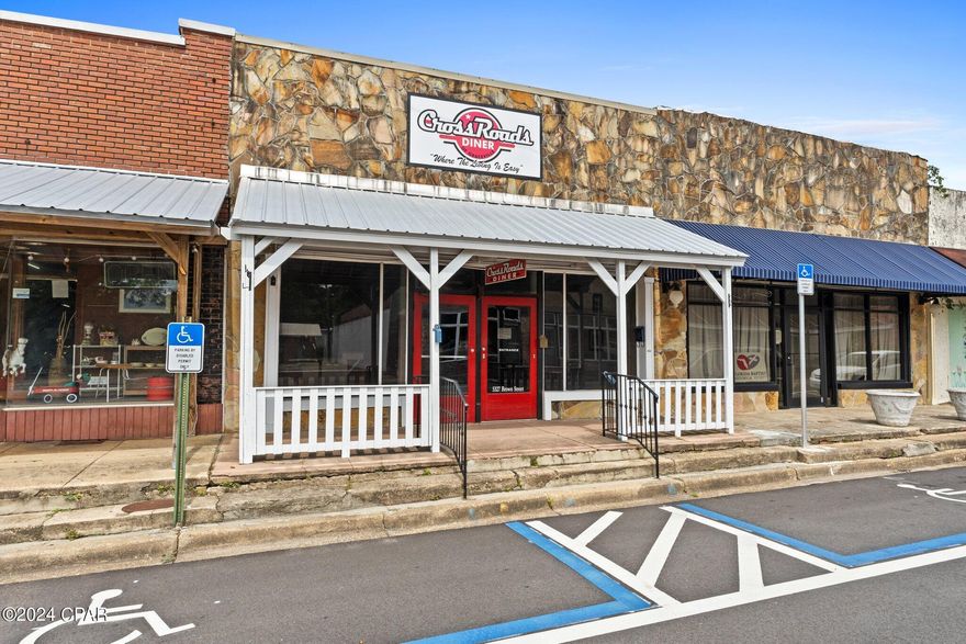 This historic building at 5327 Brown Street is fully equipped and ready for its new owners. Located in the heart of downtown Graceville, this business opportunity offers a charming and welcoming atmosphere. Although currently closed, the diner previously operated for breakfast and lunch, also featuring an ice cream parlor. The spacious dining area comfortably seats approximately 50+ customers. Inside, you'll find a well-appointed bar, custom crown molding, two restrooms, an office, a server station, and a fully-equipped kitchen. The kitchen includes a grill, flat top griddle, warmer, fryer, oven, triple sink, stainless steel prep table, and hood vent with fire suppression. This is a rare chance to revive a beloved local establishment in a thriving community. Don't miss out on this incredible opportunity to create your own success story in Graceville. Contact us today to schedule a viewing and start your journey as a proud diner owner!