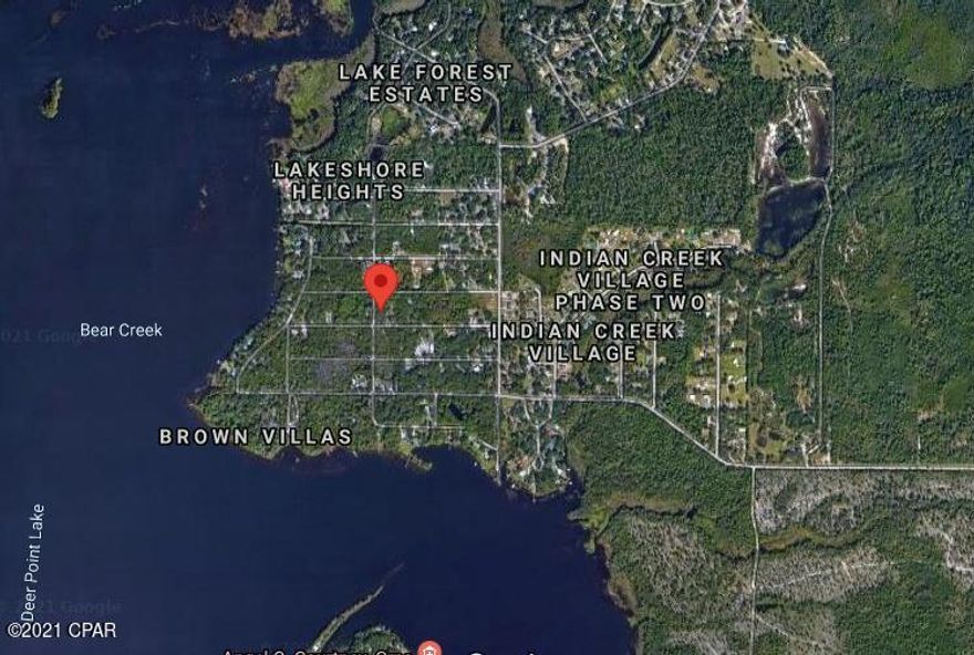 Mobile home lot with septic tank, power pole, L P Gas tank filled, 15' x 15' storage shed  and  water well in place. Come live in the country on this corner lot. Four lots for home are high and dry, rear of lot drops into a wetlands.....