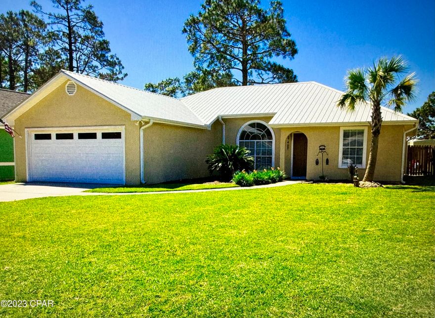 'CURRENTLY UNDER CONTRACT, SELLER WILL CONSIDER BACKUP OFFERS'Don't miss out on this Fantastic home located on a quiet cul-de-sac in a friendly neighborhood.  This charming three bedroom home is like new with: NEW Carpet, All New Appliances, New Interior Paint, New Exterior Paint, New Garage paint, insulated garage door and more.

The main living area is spacious with a vaulted ceiling and beautiful stained concrete floors.  The kitchen has solid wood cabinets, granite counter tops, stainless appliances and don't forget the fenced backyard with its paver walkway to a cozy fire pit.

This home is perfect for a starter family or retiree looking for a quiet street for the kids to play in with no through traffic.  This neighborhood it is quiet yet a short drive to shopping, Pier Park and the beautiful emerald green waters of the Gulf. Come see for yourself and make this home yours.
*All listing information should be verified by buyer