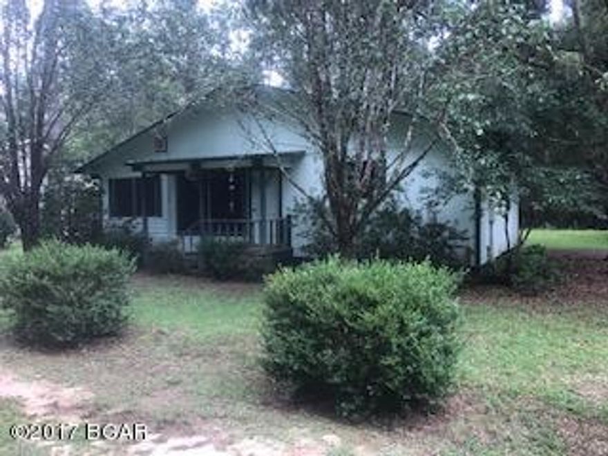 Looking for the perfect weekend retreat?? This cute and cozy 2/1 cottage is it! Home is 880+/- sq ft. living room, family/dining room and small kitchen. Located near the Choctawhatchee River and Redbug Lake. Exterior is constructed of T-111 siding with spray on stucco finish. Outside features: screened in back porch, perfect for relaxing in a rocking chair. One car carport on backside of house and a detached freestanding garage/storage building in yard complete with a fish cleaning station. Boat ramp access to the river and Redbug Lake are very close by. Deed restrictions apply.