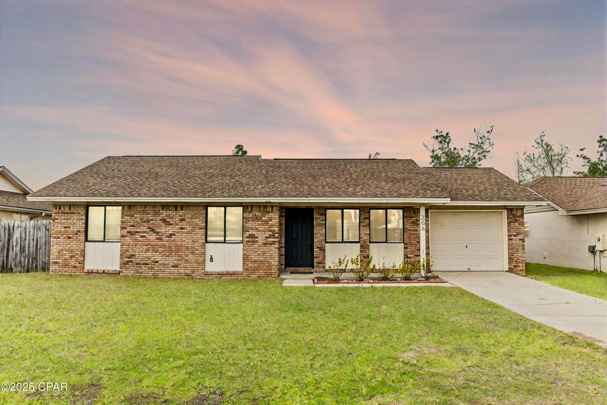 BACK ON THE MARKET AFTER 7 MONTHS - Now is your chance to view it before it's gone! Welcome to this inviting 3-bedroom, 2-bathroom home in the heart of Lynn Haven. This residence offers a thoughtfully designed layout with a bright, functional kitchen featuring a stylish two-tone cabinet design, nice appliances, and a clean tile backsplash. Some of the appliances have been updated to stainless steel, though not shown in photos. The adjacent dining and living areas create a comfortable flow perfect for everyday living and entertaining.

Step outside to an open concrete patio that overlooks a fully fenced backyard, ideal for cookouts, gardening, or relaxing with your morning coffee. The attached one-car garage provides additional storage or workspace potential.

The updated guest bath features matte black finishes, a framed mirror, and modern lighting for a fresh and polished feel. Throughout the home, thoughtful touches like updated hardware and lighting bring a modern edge to a classic layout.

Located just a short drive from Panama City's white-sand beaches and turquoise waters. This home also offers easy access to local parks, boat launches, grocery shopping, and some of the area's best fishing spots. Whether you're craving a night out or a quiet evening in, you're minutes from restaurants, shopping centers, and entertainment options. Top-rated schools and community amenities make this an excellent location for families and professionals alike.