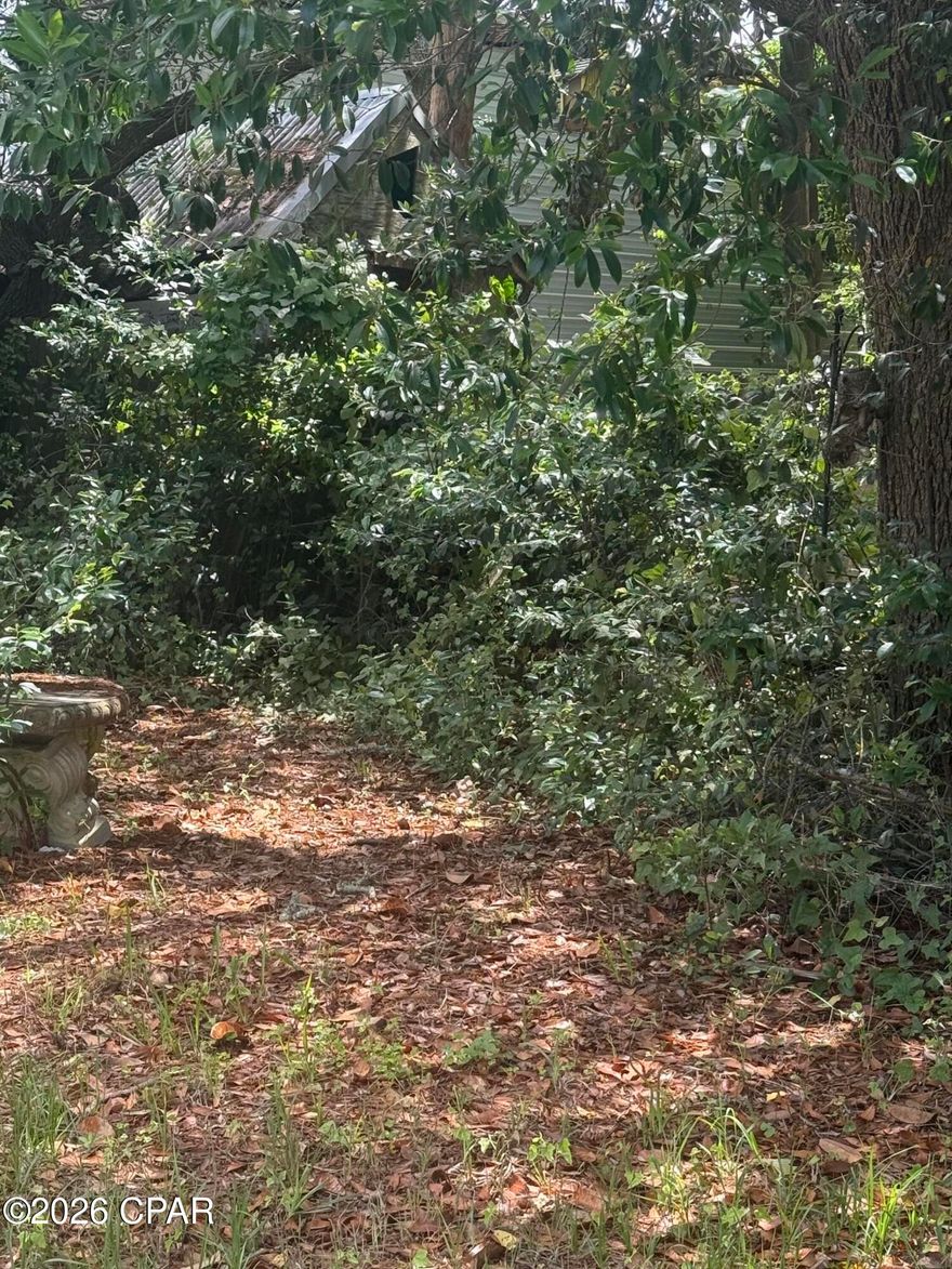 Opportunity awaits just blocks from the beach! Spacious 50x120 lot with access to sewer & gas, this property offers flexibility. Whether you are looking for an affordable beach getaway, rental investment, or future new construction site, this property delivers incredible potential just blocks away from the beach. Partially fenced lot with a shed.