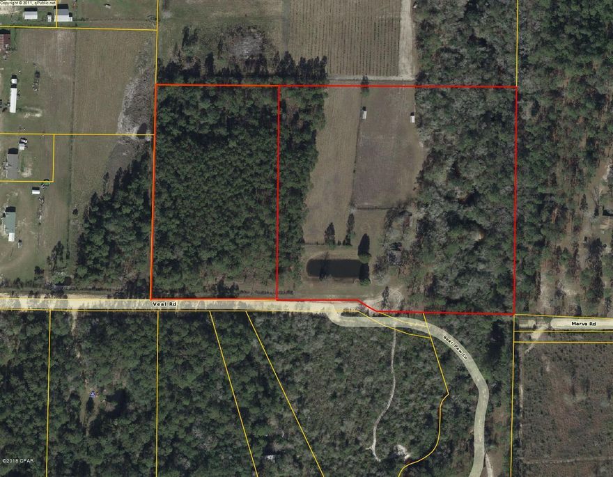 This is a large parcel with a small, two bedroom structure on the property. It has a pond as well as an creek on the East side. This is ideally located for someone who wants to have privacy and land to work or recreate on but does not want to be far from the city and it's good and services.