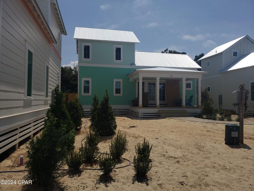 Be among the first to discover this thoughtfully curated and efficiently designed home in a charming ''surf village'' at Margaritaville Beach Cottage Resort in Panama City Beach.   The Surf's Up plan lets you connect and gather on your side porch or step inside to explore 760 sf of heated/cooled space perfectly designed to fit your every need.  These charming tiny homes feature a bedroom with a king bed and bath on the first floor and a sleeping loft with built-in full over full bunk beds on the 2nd level.  Located in the exciting new Margaritaville Beach Cottage Resort, homeowners and their rental guest will have a hard time deciding what to do first; you can relax in the huge resort pool, take a trip around the 425 ft long lazy river, ride down one of two waterslides, soak in the sun on the 580 feet of dedicated beach, have a margarita and cheeseburger from the grill, play games on the lawn, watch outdoor movies and much, much more.  Don't miss your opportunity to enjoy everything the Margaritaville lifestyle has to offer!

Water, trash, landscaping, TV, Internet and phone are all included. In addition, Club dues are $150/month and membership is mandatory for all homeowners. Total HOA, Condo and Club fees are $2068/quarter.

We anticipate construction for these homes will be complete around Summer 2024.