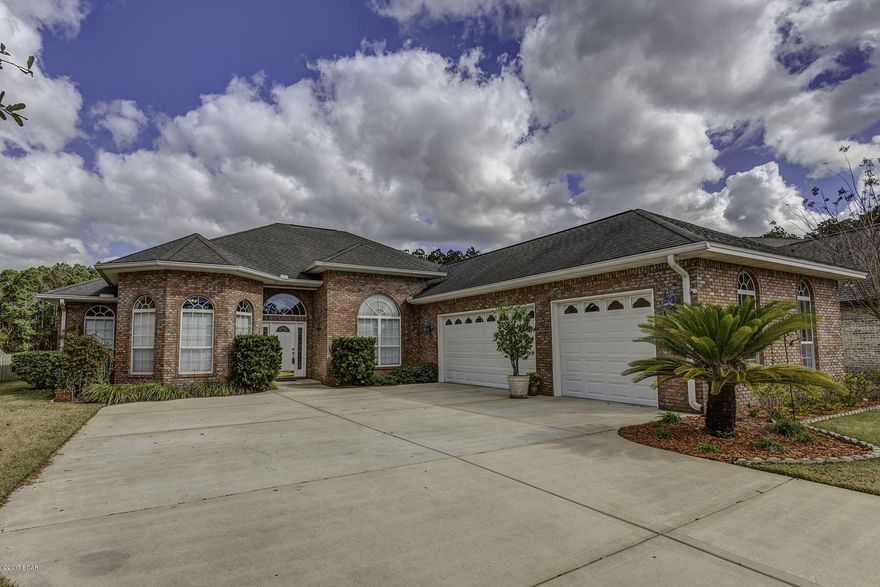 Super clean move in ready Executive Pool home located on golf course!4 bedrooms 3 full bath home with a formal dining room and an office.Bamboo floors throughout the home,even the master bedroom.Solid oak cabinets,huge pantry and a separate eat in area that overlooks the huge screened in pool with a spa.Great room with gas fireplace and lots of windows that keep it light and airy.Master bedroom has its own ensuite on one side of the home,another bedroom with a detached full bath with access to salt chlorinated fully screened-in pool, and then two additional bedrooms that share a full bath off of the kitchen.Lots of room in this home and lots of space in the 3 car attached garage.This home has a truly well thought out floor plan and an exterior perfect for hours of entertainment!Call today.