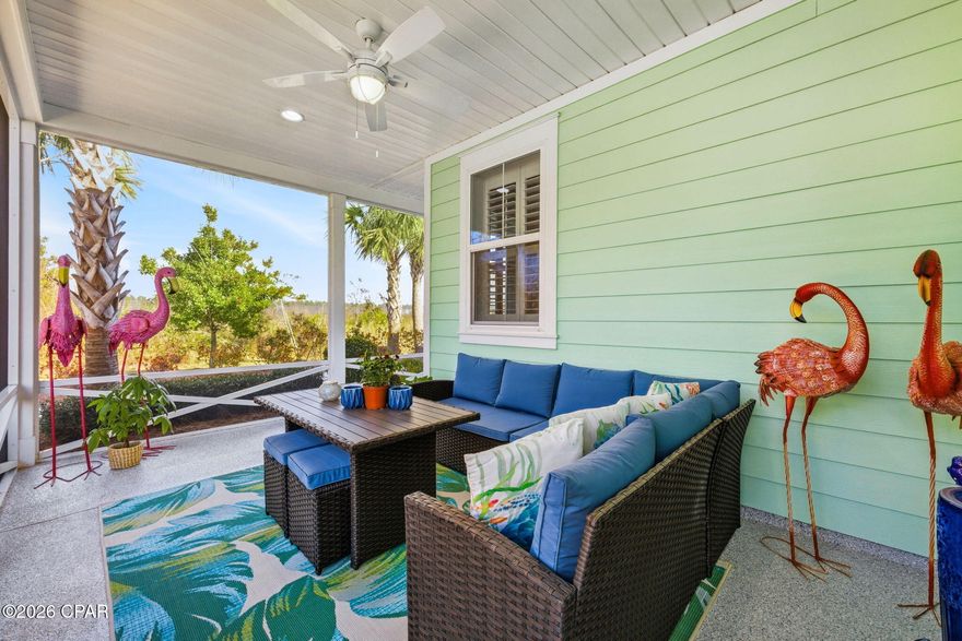 If you've ever dreamed of living in Margaritaville, welcome to the enchanting Dreamsicle Cottage--one of the most sought-after style homes in the community.  This cottage is situated in a prime location near all the amenities and the new Publix  Grocery store that is being built.  It offers plenty of privacy, with a screened wraparound porch perfect for relaxing, sipping your morning coffee, or enjoying an afternoon cocktail. Upon entering, you'll immediately notice the vaulted ceilings and 8-foot doors, creating a sense of openness and elegance, complemented by plantation shutters. Upgrades abound, including 42-inch cabinets in the kitchen, a gas stove, a double oven, and stunning quartz countertops with a matching quartz backsplash. The kitchen also boasts under-cabinet lighting, adding a warm ambiance. The neutral color palette creates a serene atmosphere, and the pendant lights over the bar are dazzling Margaritaville--Jimmy Buffett-inspired glasses. Other amenities include seamless glass tile shower in the master bath with dual sinks, and a unique chandelier in the master bedroom closet.  All new flooring was replaced last year. The two car garage  as well as the screen porch both feature durable epoxy floors for easy maintenance.  You can relax and unwind since lawncare, exterior paint, and roof replacement are all  maintained by the HOA.  This active 55 plus community provides tons of entertainment at the town square and around the outdoor resort style pool with zero entry.  The pool is also heated during certain months of the year for your added enjoyment.  You will love the two story Bar & Chill restaurant (with elevator)  overlooking the Intracoastal Waterway.  Other fantastic amenities include a state of the art fitness center & indoor lap pool and hot tub.  Around the town center you will love the theater, pet grooming, wood-working, and ceramics shop.  Gather with friends for Bocce ball, tennis, pickleball, cornhole, kayak launch and more!  Dance the night away at the bandshell on Friday and Saturday evenings.  You won't be disappointed.  Work has begun for the new Publix Grocery Store as well as other commercial properties. Why wait to build.  Change to a new  latitude today!  Short term rentals only allowed minimum 30 days not to exceed three times per year with lease.  Only occupant must be 55+ years of age and no residents under 18 years of age.  BUYER TO VERIFY MEASUREMENTS