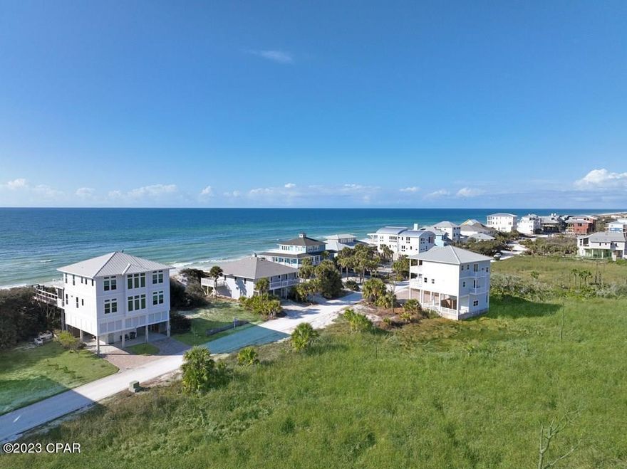 STUNNING 1ST TIER HOME SITE WITH PANORMAIC GULF & BAY VIEW LCOATED IN THE BLUFF AT SECLUDED DUNES! Almost all of the prep work has been done for you including a survey & building plans featuring a pool & elevator. Create your dream beach experience in a highly desirable neighborhood w/no HOA dues & light restrictions. The Bluff at Secluded Dunes is deemed one of the more exclusive neighborhoods on the North Cape w/deeded access to miles of sugar white sand beaches & some of the highest dunes in the area. Convenient boating access is minutes away at nearby Eagle Harbor. Teeming w/wildlife, nature enthusiasts will enjoy the drive through St Joseph St Park for native bird watching, fox & deer. You are one step closer to building your next vacation home. Call today for a showing!