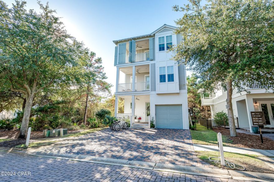 Discover this magnificent 4-bedroom, 4.5-bathroom residence nestled in Inlet Beach, merely moments away from some of the most tranquil beaches in the region. It's also conveniently close to the renowned Rosemary Beach, Alys Beach, Seacrest Beach, and the vibrant 30Avenue dining and shopping area, all accessible via a brief bike ride. Positioned on a serene street within a quaint, upscale neighborhood, this 3-story home, constructed in 2018, radiates coastal elegance and is adorned with designer elements throughout.

The ground floor is an entertainer's dream, featuring a spacious living room, dining area, and a gourmet chef's kitchen. Additionally, this level houses a single garage, a powder room, and ample storage space. The second floor is home to three bedrooms and a large secondary living space, ideal for children or visiting relatives. The entire third floor is dedicated to the luxurious master suite, providing a private retreat to unwind. This suite opens onto two covered porches, offering a serene spot to relish the gentle gulf breezes and stunning Gulf of Mexico views.

Other highlights of this exquisite home include a fenced yard, access to a community pool shared with just nine other residences, charming shiplap walls, and more, making this property a true gem in Inlet Beach.