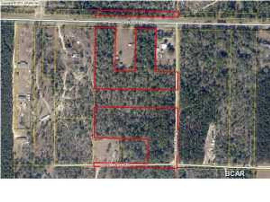 /*/*/*/ Almost **14 ACRES** of wooded land on Highway 20! /*/*/*/ (All measurements and school districts are approximate and must be verified if important.)