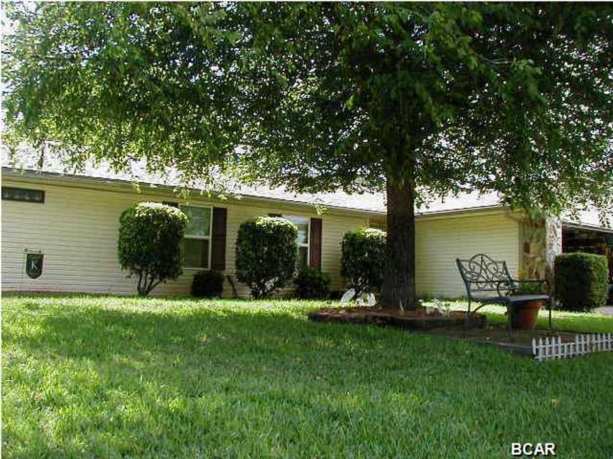 You won't be disappointed in viewing this home, well maintained, great condition on a very attractive street. Features include big master bedroom, with huge closet (even room for computer or desk!) and a upgraded master bath with jetted tub and separate tile shower. Big greatroom with fireplace. Outside you will find a great backyard, screen porch, out building used as a workshop and an area for storage. Also a garden area near the workshop. Well pump for saving money on watering. On the right side of home is a double gate if you need to get a boat, etc, into the backyard. Heat pump, water heater, roof, all replaced by current owners. PLEASE SEE ATTACHED LIST IN DOCUMENTS.Location convenient to both Lynn Haven and Panama City for shopping, restaurants, hospital.