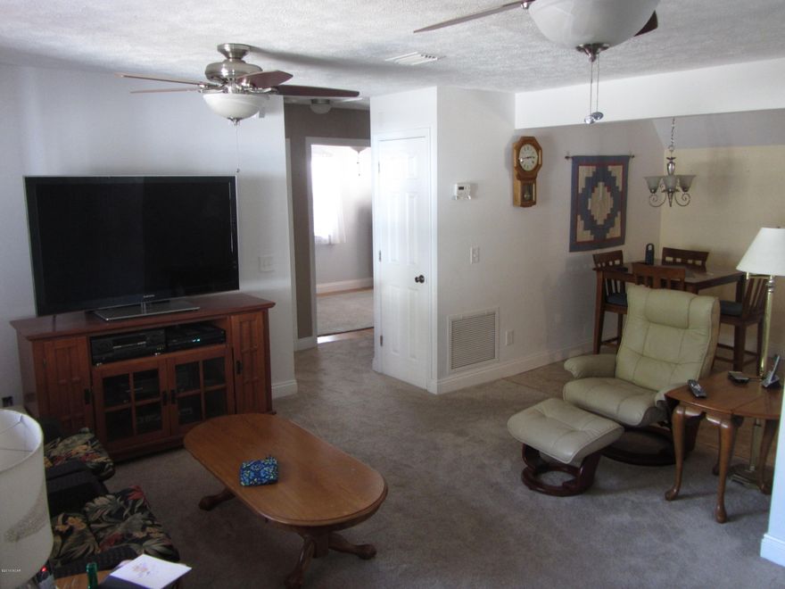 Nice older home in St. Andrews with rental income potential. Property features 3BR/2B home in front of the property, and 1BR/1B in-law suite in back. Both are designed with hardwood and carpet throughout. Backyard has drive through garage for added convenience. This one is a steal!