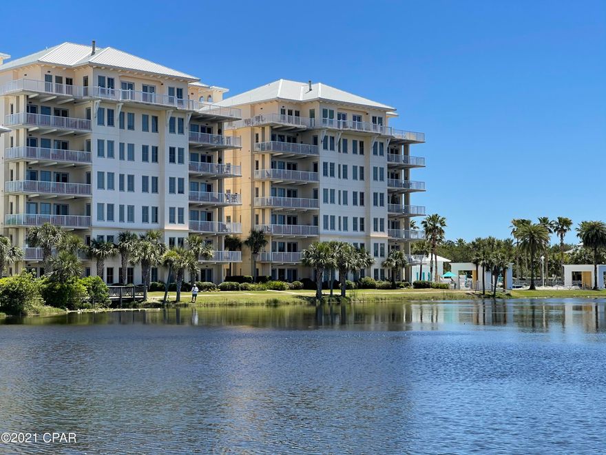 Spacious end unit in Carillon Beach. Located on the lake with Gulf of Mexico views. You will find nice interior touches such as plentiful windows, 10' ceilings, Wolf six burner stove, wine cooler, ice machine, stainless appliances, fireplace and master bath features a steam shower. Large corner balcony with gas grill and fabulous views. Beautiful resort- style pool with two covered, lakefront hot tubs. Two minutes to popular 30A eateries and shops.