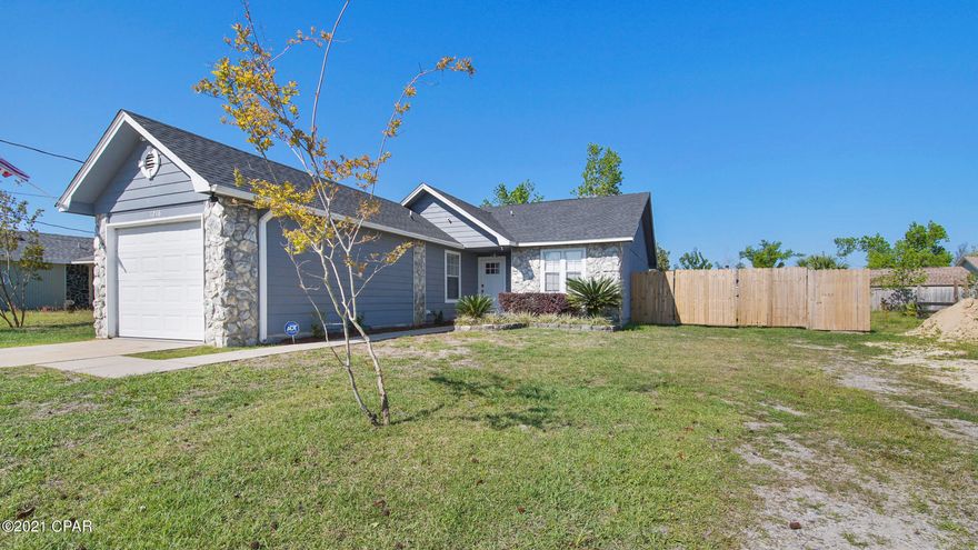 Wait until you see this well-maintained home located in the small, charming community of Lynn Haven. This 3-bedroom, 2 full bath house has been painted and primed with two coats of modern style color. The owner has updated and renovated with crown molding, closet systems, kitchen backsplash, Smart A/C panel, lighting, space-saving under counter trashcan, privacy fence, storage, lawn and yard care, and the list goes on and on. There is plenty of space to store your Boat or RV on the property on the large lot (75x150ft). New Roof and A/C installed in 2018. Checkout the complete list of Renovations/Improvements/Updates under the documents tab for this listing.