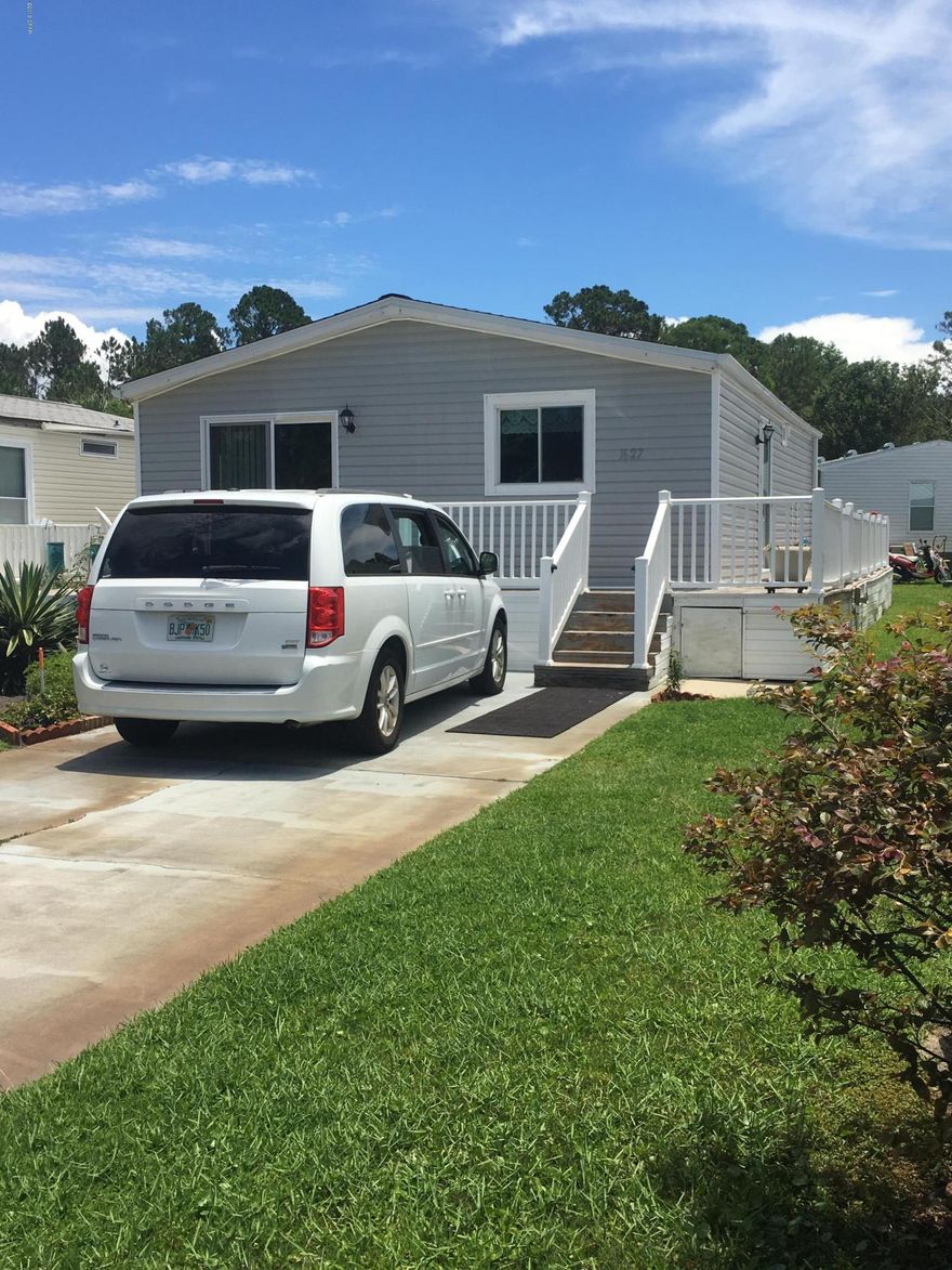 Age,size, dimensions are all approx. One of the only 55 plus communities in Panama City Beach and at an affordable price. This is deeded

property you own with a nice home.  Perfect for year round living or as a second home and beach get away. Bathrooms have been remodeled and have spacious showers. Master bedroom has a walk-in closet and an additional closet has been added. There is a large workshop with electricity & and a new roof and patio space in the nicely landscaped backyard. New roof and insulated windows and doors. New siding is on the home.  The interior of the home has new bedroom carpet and a spacious kitchen dining area. This small retirement community  is located at the end of a quiet road yet convenient to the all amenities and the  beaches. Pool and club house on​​‌​​​​‌​‌​​​​‌​​‌​​​​‌‌ site.