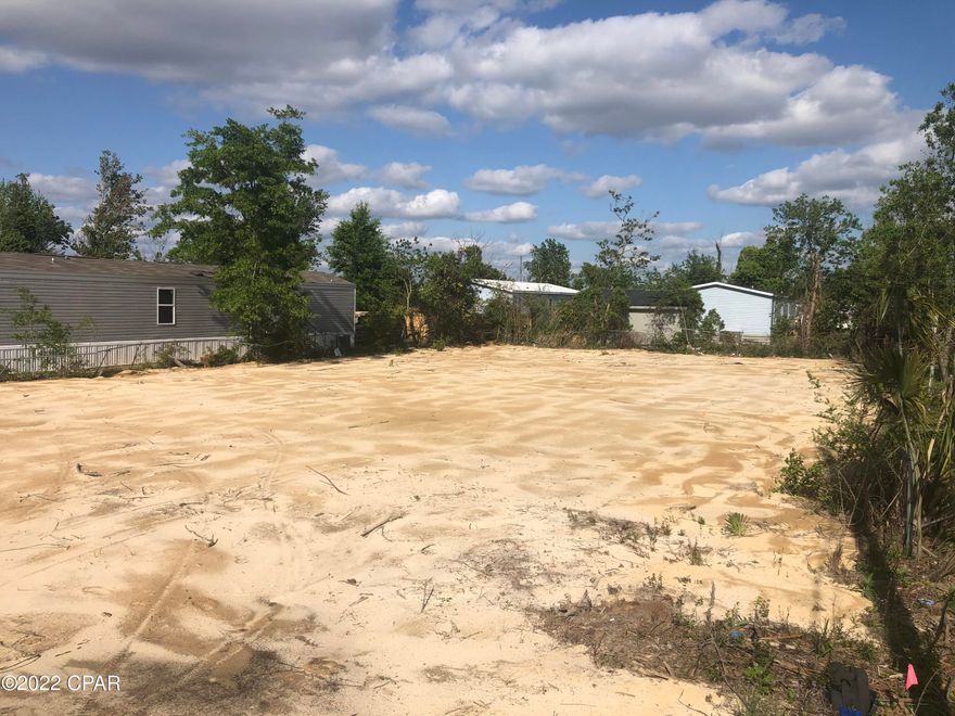 This Lot has been cleard and is ready for your mobile home. Close to town, shopping and resturants. Convenient to Tyndall AFB, Panama City and Callaway. County utilites. Call today.