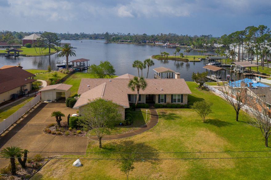 Welcome to Kings Point. What a wonderful boating opportunity this property offers tucked just inside Pretty Bayou with quick access to the bay.  This is the wide area of the bayou which offers serene views of the water from just about every room which will have you saying WOW!  This 2 bedroom 2 bath home with plenty of space for relaxing or entertaining has a split floor plan, with a master suite that has access to the Florida Room and looks out onto the water. The open floor plan has both dining, living, breakfast and den and kitchen, all flow well.  This house has many closets and storage and has been well cared for. Enjoy the evening sitting out on the lanai with all the windows open feeling the breeze coming off the Bayou.  You will fall in love with this home and all  its charm.
