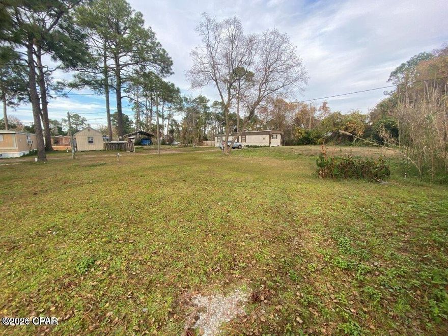 This investment collection is part of 3 lots that can be purchased individually or all together. This one is Parcel ID's 27779-015-000. This one has a mobile home that has no value and is occupied. The property is zoned R-2(BC) which permits two townhomes to be built or a duplex. Buyer can purchase one property or all three at one time. Each property has it's own septic and sewer is available nearby. A power pole is also on each property. 
The drain field for the septic tanks is on this property. 

The white mobile home and the storage unit on 2412 Dorothy A&B does not convey. 

Possible financing available with a builder to build your investment/income property.