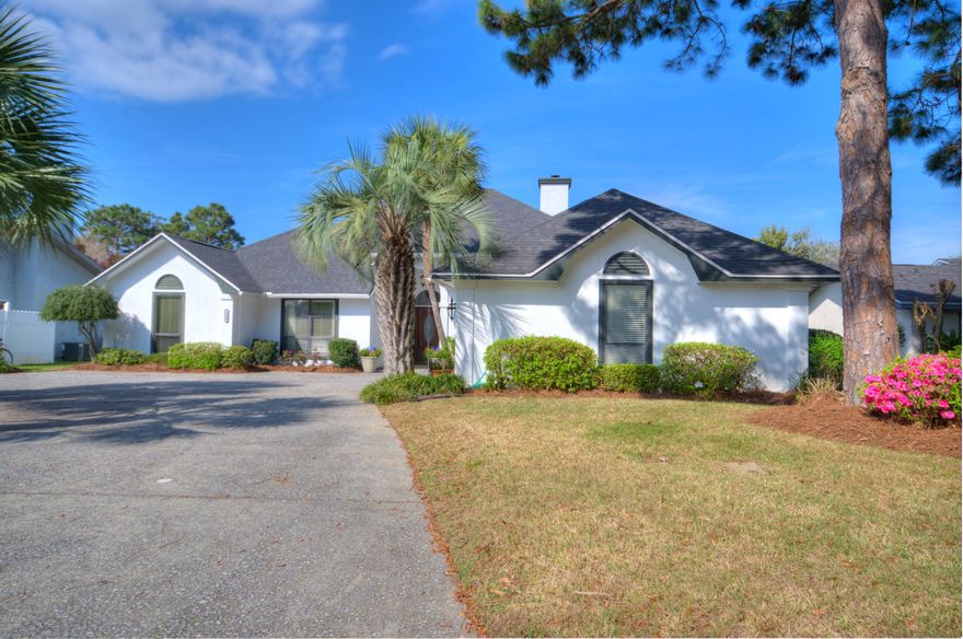 Waterfront living at its best in this renovated Bay Point canal home.  This home boasts 80 feet of waterfront including a new seawall, 10,000 pound boat lift, deck and a massive covered back porch. Thoughtful owners have updated and upgraded the home completely since their ownership to include a new hip roof with architectural shingles, a new HVAC and state of the art programmable hot water heater. This home has wonderful flow and has been host for many gatherings, dinners, and celebrations.  A renovated kitchen with Bosch, JennAir, and Samsung appliances opens to the breakfast room with fireplace. The living room has wonderful water views with new glass, a fireplace, wet bar area, and a hand painted built in buffet. There is a formal dining room currently being used as an additional den / music room.  The master suite has wonderful views and access to the waterfront deck.  The master bath has been wonderfully renovated with a tiled shower and separate claw foot tub, a double vanity, and spacious walk in closet.  The two guest rooms are down the hall from the master bedroom with "Jack & Jill" bath and private in room sinks & linen closets. The third guest room behind the kitchen makes an excellent private study or occasional guest room.  Each guest bedroom has a spacious closet.  There are two double closets in the kitchen hallway; pantry space on steroids!  The laundry room is also very large with extra space for storage.  We have plans in the file for Cox Pools to add a pool to the waterfront area - there is plenty of room!  Please make an appointment to see this beautiful renovated waterfront home in Bay Point today!  Measurements are approximate; buyer must verify.