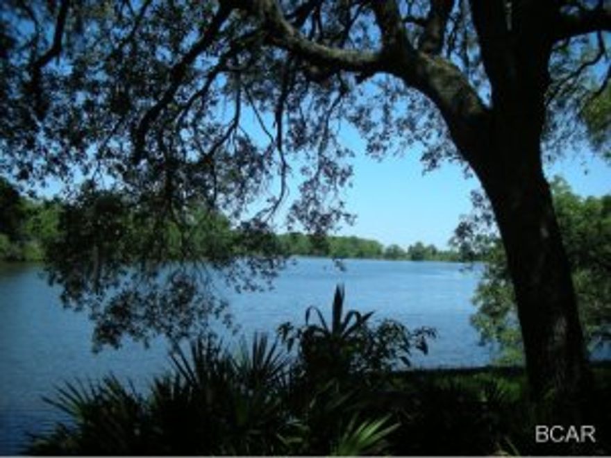This is a gorgeous property right on Lynn Haven Bayou. Three lots combined with North Bay access for a small boat, kayak or jet ski. The huge Heritage oak trees are magnificent! Click on the VT link to see your waterfront view. (All measurements are approximate.Please verify all dimensions)