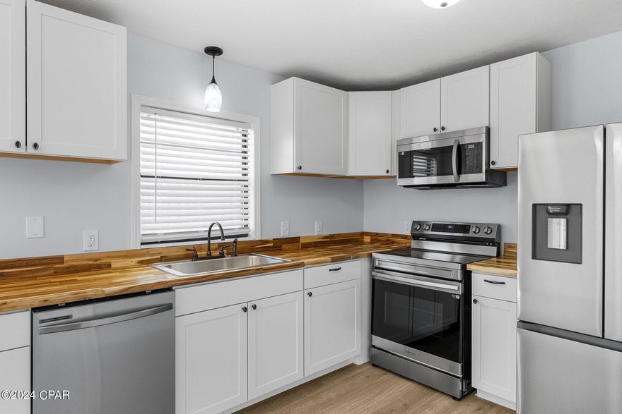 Welcome to this beautifully renovated 2-bedroom, 2-bathroom home, perfectly situated just minutes from the thriving Tyndall Air Force Base and centrally located in in Bay County. This home is ideal for military personnel and their families, a great investment for investors and or a great place for someone wanting to live, work and enjoy all that Bay County has to offer. You will be minutes from the Callaway Boat Ramp accessing East Bay. After a day on the water get ready for shopping, dining and the best of Panama City and The World's Most Beautiful Beaches. 

With this home you will enjoy modern finishes and stylish touches.  From the new flooring to the contemporary fixtures, every detail has been thoughtfully considered making this a place you will look forward to coming home to each day. The kitchen boasts brand new appliances, sleek countertops, and ample cabinet space. The bedrooms have lush new carpet and the bathrooms have been updated to a modern style offering a generous layout with a serene relaxing feel.
Don't miss the chance to make this house your home.