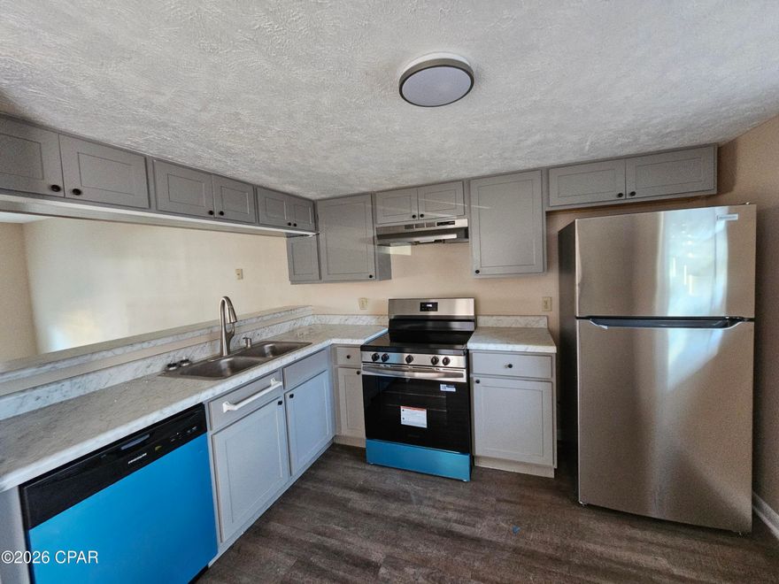 Charming 3 Bedroom 3-bathroom townhome with spacious living area features tile flooring, creating a modern and easy-to-maintain space. Enjoy a beautifully kitchen with lots of cabinets, new ss appliances and countertops space. Washer/dryer hook-ups included for your convenience. The open patio at the rear of the home overlooks a private fenced backyard, perfect for outdoor relaxation conveniently located near shopping, schools, and parks. Tenant responsible for all utilities.