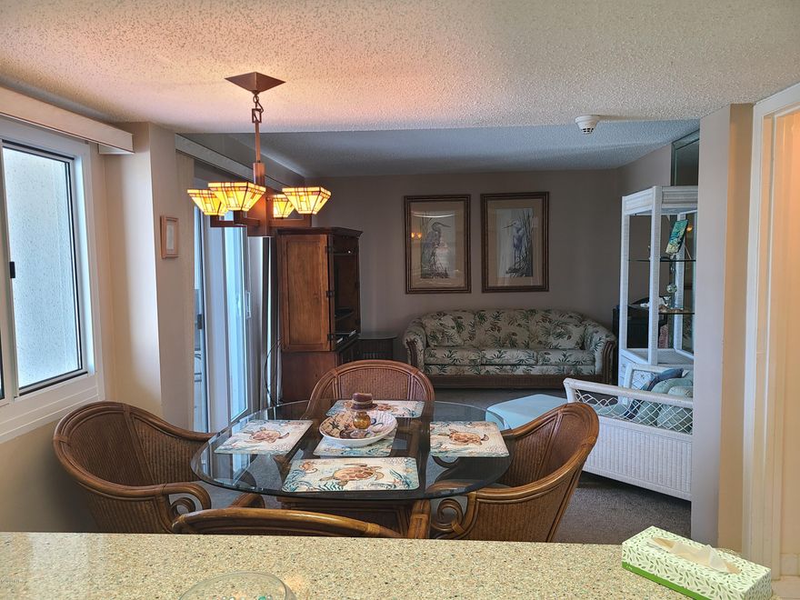 CURRENTLY UNDER CONTRACT, SELLER ACCEPTING BACKUP OFFERS' Great 2 bedroom 2.5 bath furnished unit with living room overlooking the Tower's indoor/outdoor pool and a Gulf view from the living room balcony and from the upstairs Master Bedroom and its balcony.  The kitchen features stainless steel appliances, tile backsplash, and silestone countertops. The stack washer/dryer unit in the downstairs laundry/half bath is two years old.   Pinnacle Port Resort is situated on a 25+ acre site within a beautiful gated community having over ¼ mile of beach frontage!   Interior Photos will be added after 10/26/2020.  2 turtle lamps in living room are excluded from sale. The complex has lots of amenities including two swimming pools, tennis courts sauna/steam room, fitness room, its own private freshwater dock with boat slips boat launch and wi-fi. Please note that the Association fees include electricity for heating, cooling and hot water.  The owner pays a small electricity bill for lighting and appliances only.