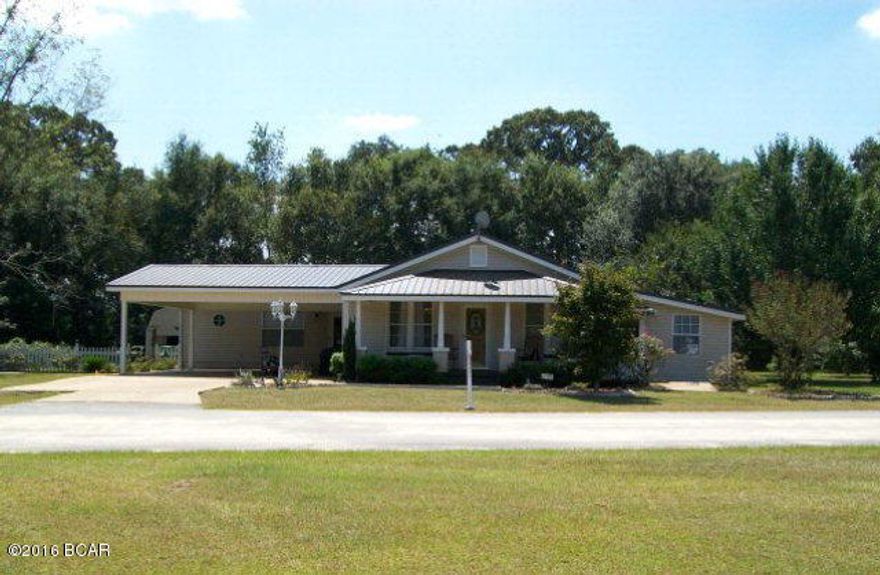 GREAT COUNTRY COTTAGE! 3 Bedroom 3 Bath home with a sunroom which can be converted to another bedroom! There is a 434 sq ft Mother In law apartment with its own Entrance and its own living area, bedroom, bath and kitchenette! Newer Metal Roof, Heating and Air unit. The home was completely remodeled from floors to ceiling in 1999 including the electric and plumbing! The home is VERY clean and is ready to move into! Nicely landscaped 1 acre yard with a 16x24 Workshop with electric. Storage Building. Please see photos and floor plan attached to listing! Call for your personal showing today!