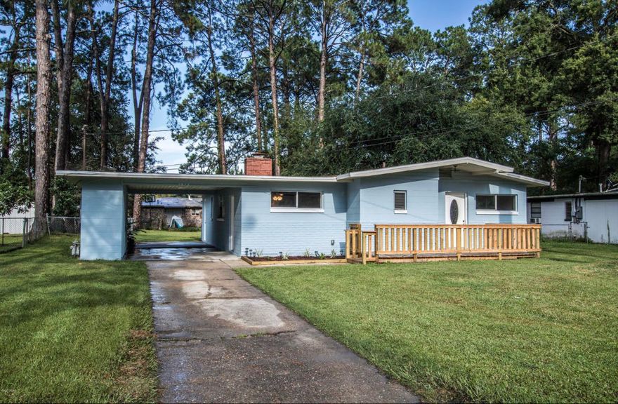 BACK ON THE MARKET! BUYER'S FINANCING FELL THROUGH!  Cozy renovated 2/2 in St. Andrews is now ready for you! Enjoy all the entertainment space it has to offer in the living area, dining area, AND the den with fireplace!  Home has been converted into a 2 bedroom to provide a huge Master Retreat that spans the entire back side of the house. However, if 3 bedrooms are needed, it can absolutely be converted back. The master bath is oversized with Laundry. Major components of the home are recent- updated electrical and AC in 2017, new roof and privacy fence in 2018. Outside, you have a carport and covered storage area, leading to the back yard where you will find more treats, like a 12x20 shop, a 21x20 metal carport, and a fabulous firepit area that can be lit up at night! The only thing missing is YOU-Schedule a private tour today! All info contained herein is believed to be true- if important, buyer must verify!