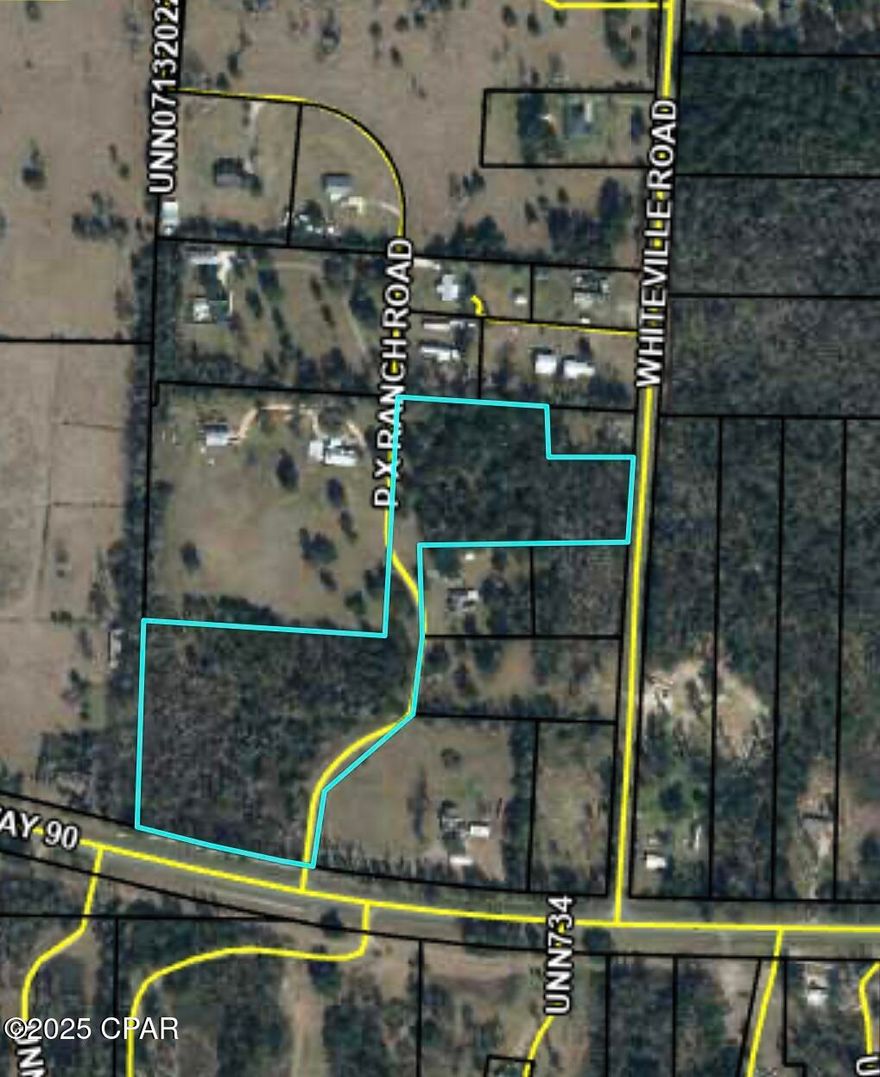 Looking for a lot to build on?? This wooded 13.5+/-  acres can be made into two lots. Located just between Cottondale and Marianna of Hwy 90!!