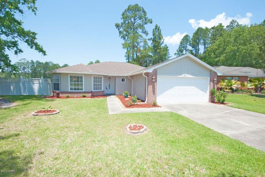 Move in ready home located near Tyndall Air Force base, schools, restaurants and shopping. This open floor plan is spacious and perfect for entertaining. Kitchen features breakfast bar, stainless appliances, deep sink and granite counter tops. Breakfast room and dining room. Roomy master bedroom and bath with walk in closet. Large yard with privacy fenced backyard and screened in back porch.